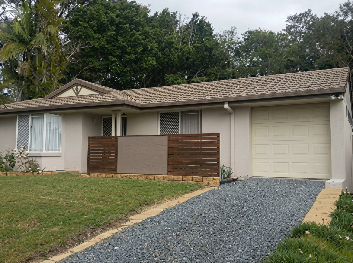 Single-storey suburban home with smooth cream render